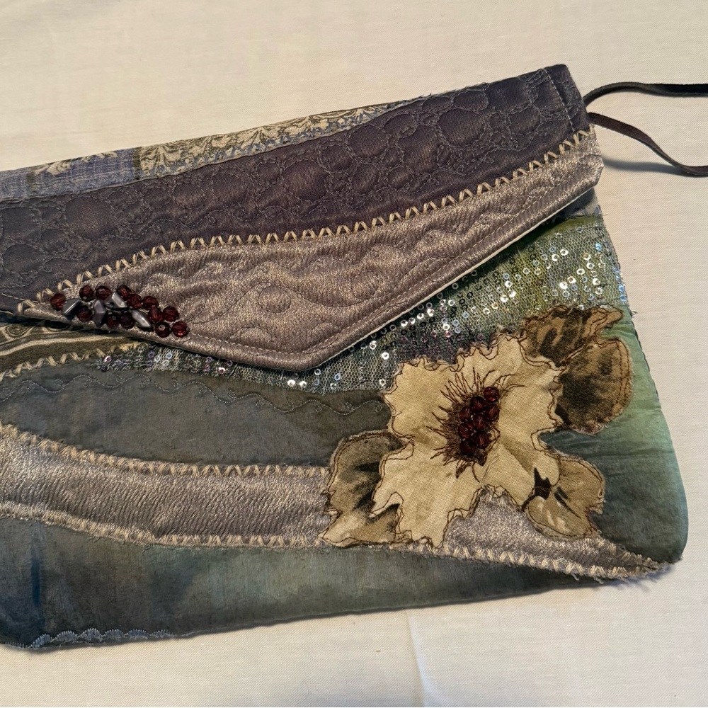 Elegant Multicolor Clutch with Floral Design